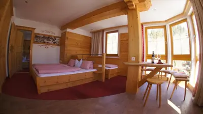 Ein Bett oder Betten in einem Zimmer der Unterkunft Hotel Schweizerhof