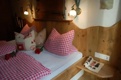 Ein Bett oder Betten in einem Zimmer der Unterkunft Hotel Schweizerhof