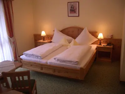 Ein Bett oder Betten in einem Zimmer der Unterkunft Gasthof Weberbauer