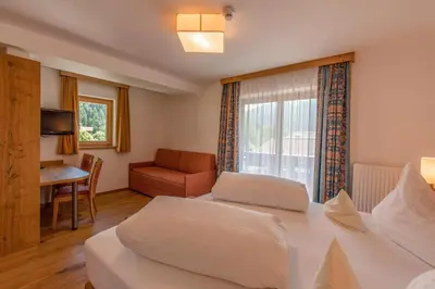 Ein Bett oder Betten in einem Zimmer der Unterkunft Gasthof Weberbauer