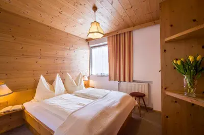 Ein Bett oder Betten in einem Zimmer der Unterkunft Appartements Bachler