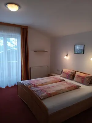 Ein Bett oder Betten in einem Zimmer der Unterkunft Ranerhof