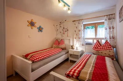 Ein Bett oder Betten in einem Zimmer der Unterkunft Apartment Landhaus Mühlau in Tirol
