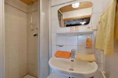 Ein Badezimmer in der Unterkunft Apartment Landhaus Mühlau in Tirol
