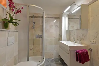 Ein Badezimmer in der Unterkunft Alpenchalets Wilder Kaiser