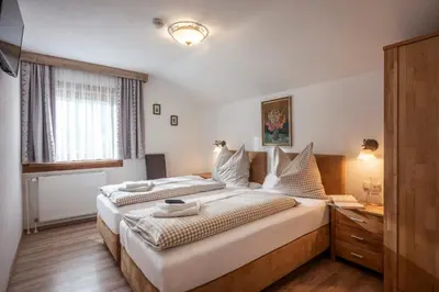 Ein Bett oder Betten in einem Zimmer der Unterkunft Ferienhaus Bachler