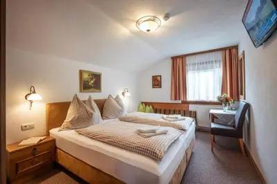 Ein Bett oder Betten in einem Zimmer der Unterkunft Ferienhaus Bachler