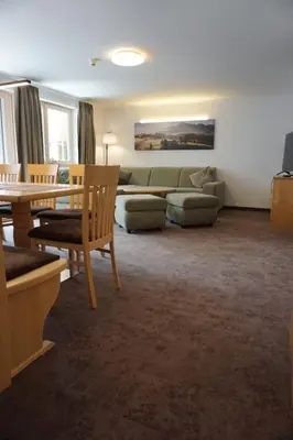 Ein Sitzbereich in der Unterkunft Appartements Bergsonne
