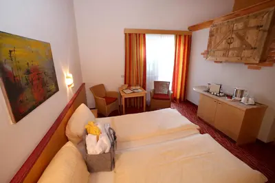 Ein Bett oder Betten in einem Zimmer der Unterkunft Hotel Eder Michaela