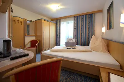 Ein Bett oder Betten in einem Zimmer der Unterkunft Hotel Eder Michaela
