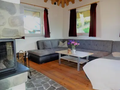 Ein Sitzbereich in der Unterkunft Chalet France