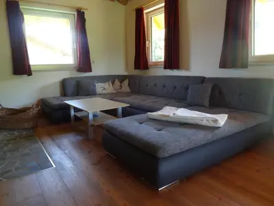 Ein Sitzbereich in der Unterkunft Chalet France