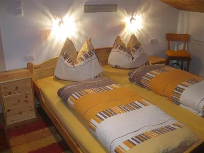 Ein Bett oder Betten in einem Zimmer der Unterkunft Rossruckhof