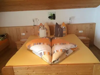 Ein Bett oder Betten in einem Zimmer der Unterkunft Rossruckhof