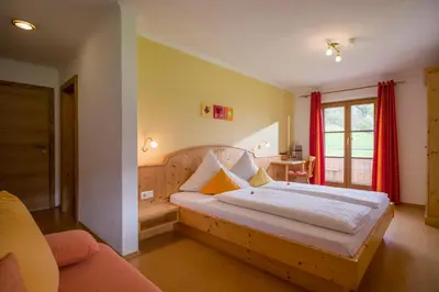 Ein Bett oder Betten in einem Zimmer der Unterkunft Wanishof