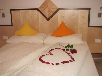 Ein Bett oder Betten in einem Zimmer der Unterkunft Wanishof