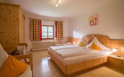 Ein Bett oder Betten in einem Zimmer der Unterkunft Wanishof