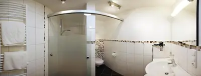 Ein Badezimmer in der Unterkunft Haus Schmetterling