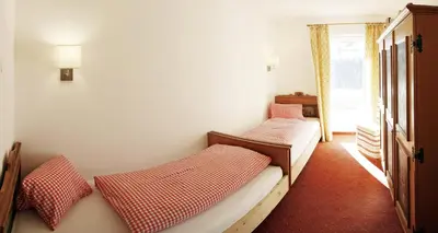 Ein Bett oder Betten in einem Zimmer der Unterkunft Haus Schmetterling
