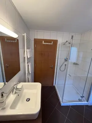 Ein Badezimmer in der Unterkunft Haus Schmetterling