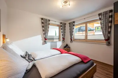 Ein Bett oder Betten in einem Zimmer der Unterkunft Apart Bergluft