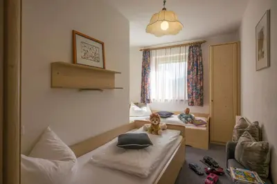 Ein Bett oder Betten in einem Zimmer der Unterkunft Landhaus Dengg