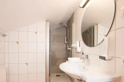 Ein Badezimmer in der Unterkunft Gasthaus Jakober