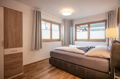 Ein Bett oder Betten in einem Zimmer der Unterkunft Apart Alpenrose