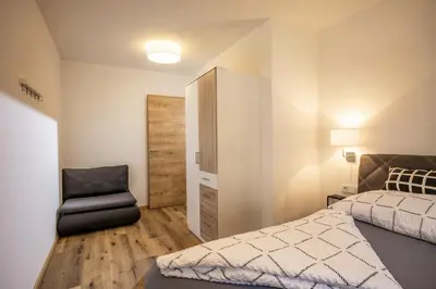Ein Bett oder Betten in einem Zimmer der Unterkunft Apart Alpenrose