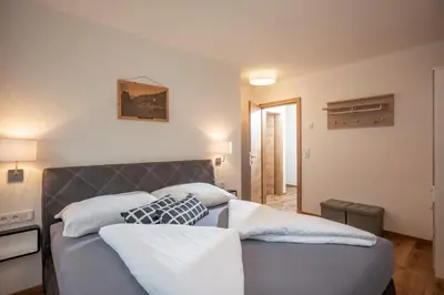 Ein Bett oder Betten in einem Zimmer der Unterkunft Apart Alpenrose