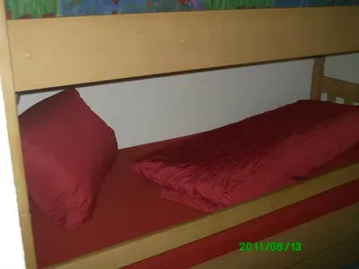 Ein Bett oder Betten in einem Zimmer der Unterkunft Ferienwohnungen Egger
