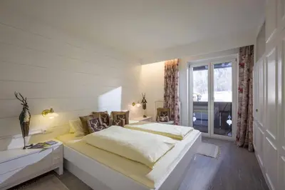 Ein Bett oder Betten in einem Zimmer der Unterkunft Hotel Garni & Appartements Ilgerhof