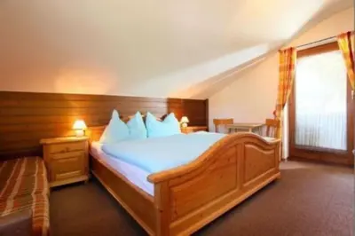 Ein Bett oder Betten in einem Zimmer der Unterkunft Haus Sonnheim