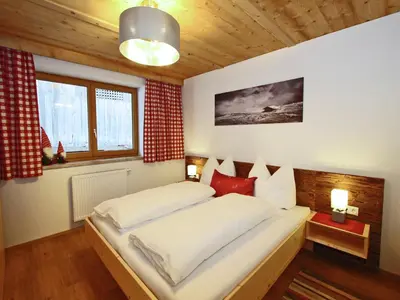 Ein Bett oder Betten in einem Zimmer der Unterkunft Spacious Holiday Home near Ski Area in Kaltenbach