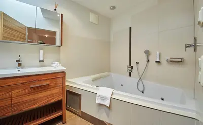Ein Badezimmer in der Unterkunft Hotel Schachner
