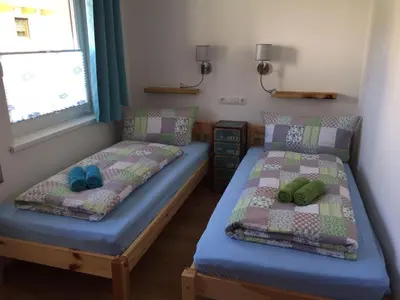 Ein Bett oder Betten in einem Zimmer der Unterkunft Haus Astner