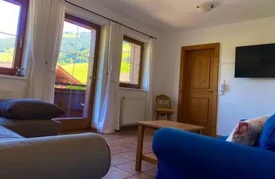Ein Sitzbereich in der Unterkunft Haus Hislop