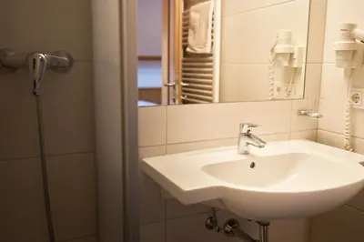Ein Badezimmer in der Unterkunft Pension Vier Jahreszeiten