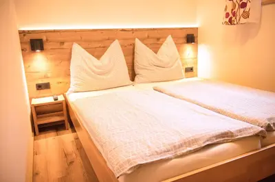 Ein Bett oder Betten in einem Zimmer der Unterkunft Haus Alexander
