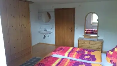 Ein Bett oder Betten in einem Zimmer der Unterkunft Bauernhaus Fankhauser