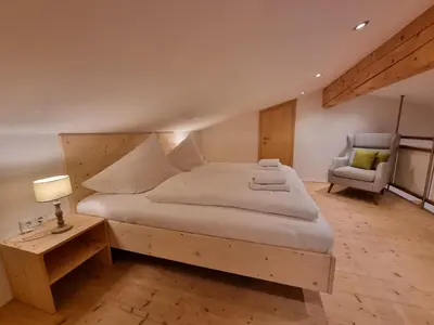 Ein Bett oder Betten in einem Zimmer der Unterkunft Ferienwohnungen Strass im Zillertal