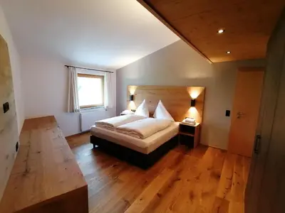 Ein Bett oder Betten in einem Zimmer der Unterkunft Ferienwohnungen Strass im Zillertal