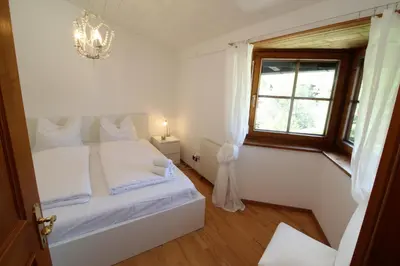 Ein Bett oder Betten in einem Zimmer der Unterkunft Chalet Gaisberg by Apartment Managers