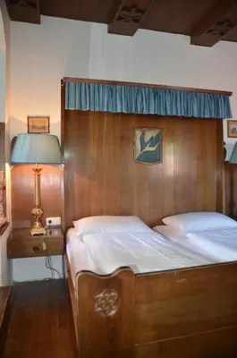 Ein Bett oder Betten in einem Zimmer der Unterkunft Schloss Münichau