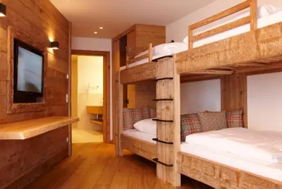 Ein Bett oder Betten in einem Zimmer der Unterkunft Maierl-Alm & Maierl-Chalets