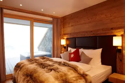 Ein Bett oder Betten in einem Zimmer der Unterkunft Maierl-Alm & Maierl-Chalets