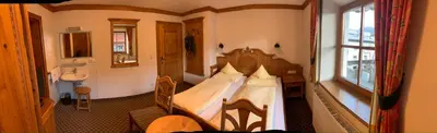 Ein Bett oder Betten in einem Zimmer der Unterkunft Pension Schmidinger