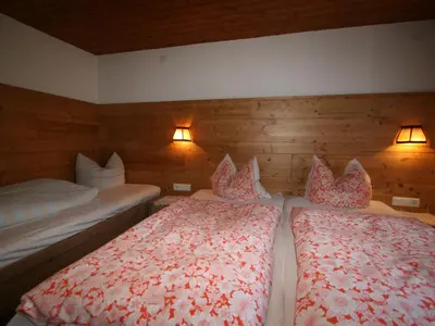Ein Bett oder Betten in einem Zimmer der Unterkunft Apartment Schusterhäusl-1 by Interhome