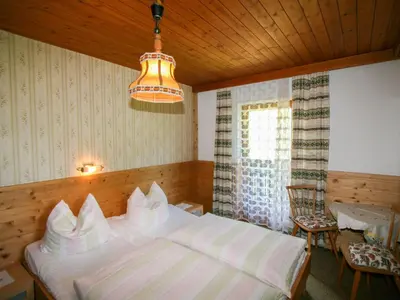 Ein Bett oder Betten in einem Zimmer der Unterkunft Apartment Schusterhäusl-3 by Interhome