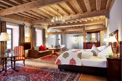 Ein Bett oder Betten in einem Zimmer der Unterkunft Hotel Schloss Mittersill